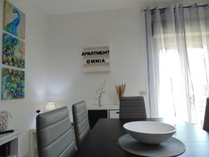A seating area at Apartment Omnia