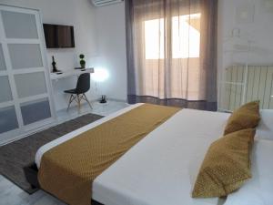 A bed or beds in a room at Apartment Omnia
