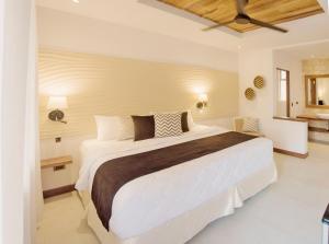 Voodi või voodid majutusasutuse Umami Hotel - Adults Only toas
