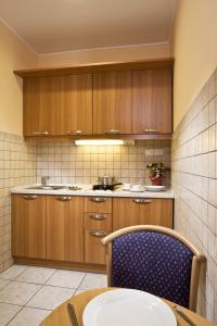 Kuchyň nebo kuchyňský kout v ubytování Jagelló Business Hotel