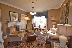 a living room with furniture and a fireplace at Briarwood Bed & Breakfast in Elmsdale