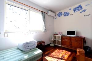 TV a/nebo společenská místnost v ubytování Alice Springs Homestay
