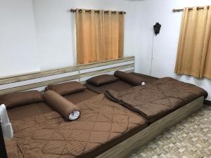 Postel nebo postele na pokoji v ubytování Kitti Rose Home