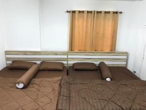 Postel nebo postele na pokoji v ubytování Kitti Rose Home