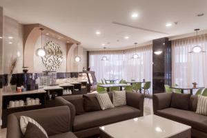 Posezení v ubytování Maple Hotel