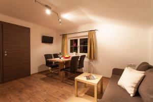 TV a/nebo společenská místnost v ubytování Appartement Haus Pichler