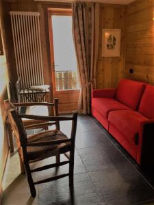 Posezení v ubytování Albergo Alpenrose Ski&Bike Mountain Hotel