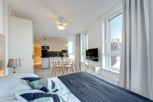 Posteľ alebo postele v izbe v ubytovaní Chrobry Apartamenty Gdańsk Grodzka 10 + 37 fotografií
