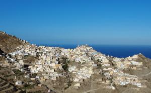 a village on the side of a mountain at Olympos Archipelagos in Olympos