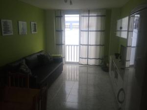 A kitchen or kitchenette at Apartamento lima