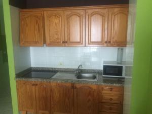 A kitchen or kitchenette at Apartamento lima