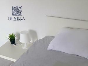 Postel nebo postele na pokoji v ubytování IN Villa Guesthouse