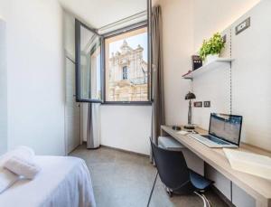 Postel nebo postele na pokoji v ubytování Camplus Palermo Normanni - Casa per ferie