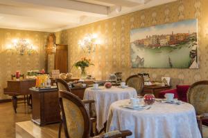 Majoituspaikan Palazzo Bembo - Exclusive Accommodation ravintola tai vastaava paikka