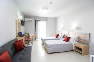 Voodi või voodid majutusasutuse Hera Zakynthos Hotel toas