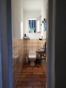 Koupelna v ubytování A CASA DI MAMMÓ