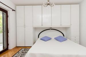 Postel nebo postele na pokoji v ubytování Apartments Anka