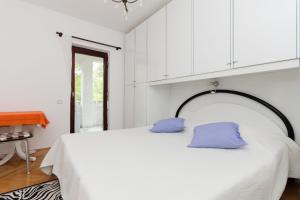 Postel nebo postele na pokoji v ubytování Apartments Anka