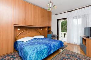 Postel nebo postele na pokoji v ubytování Apartments Anka