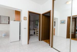Kuchyň nebo kuchyňský kout v ubytování Apartments Anka