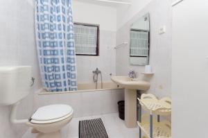 Koupelna v ubytování Apartments Anka + 37 fotografií