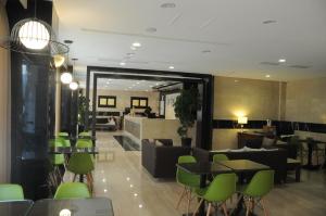 Posezení v ubytování Maple Hotel