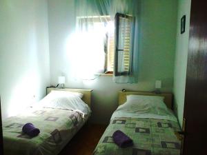Posteľ alebo postele v izbe v ubytovaní Villa Magnolia