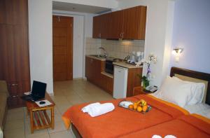 Cuina o zona de cuina de Aria Hotel Samos Town