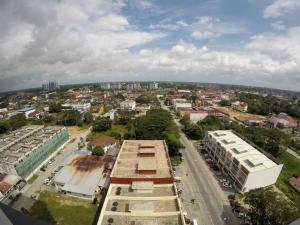 an aerial view of a city with buildings and a street at Zulanie Family Studio at D'Perdana Apartment, Spacious and Cozy with POOL, Free Wifi & Netflix in Kota Bharu