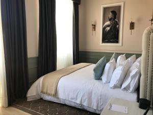 Letto o letti in una camera di Illa Experience Hotel