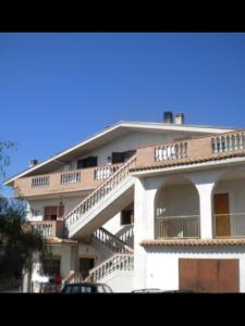 a building with balconies on the side of it at L' Alba di Alice in Silvi Marina