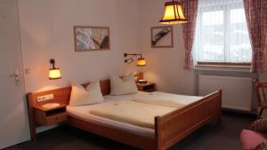 Llit o llits en una habitació de Haus Florian