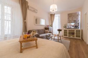 Posteľ alebo postele v izbe v ubytovaní Apartments & Rooms Perla