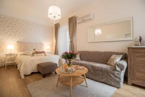 Posteľ alebo postele v izbe v ubytovaní Apartments & Rooms Perla