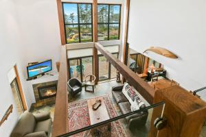 an overhead view of a living room with a fireplace at Black Rock Ridge in Ucluelet