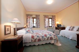 Postel nebo postele na pokoji v ubytování Hotel Molino D'Era