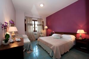Postel nebo postele na pokoji v ubytování Hotel Molino D'Era