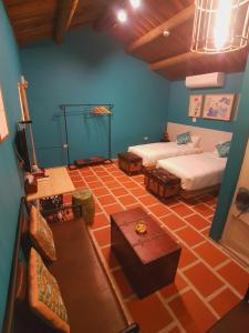 Postel nebo postele na pokoji v ubytování Zhu Shan Homestay
