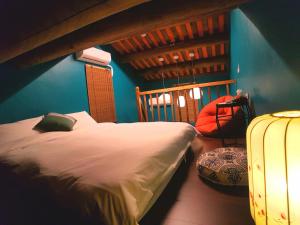 Postel nebo postele na pokoji v ubytování Zhu Shan Homestay