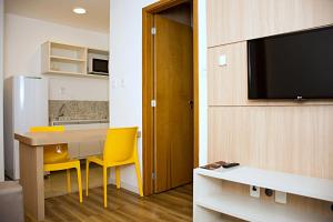 TV a/nebo společenská místnost v ubytování Unico Apart Hotel