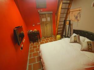 Postel nebo postele na pokoji v ubytování Zhu Shan Homestay