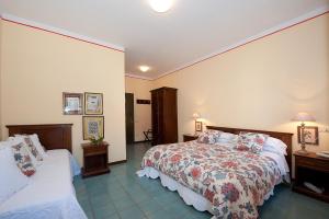 Postel nebo postele na pokoji v ubytování Hotel Molino D'Era