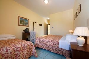 Postel nebo postele na pokoji v ubytování Hotel Molino D'Era