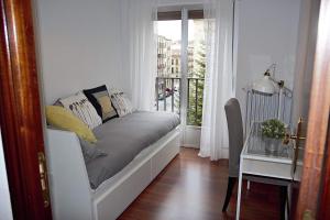 Posto letto in camera con finestra di Apartamento Marquesa de Almarza a Salamanca