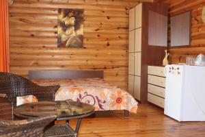 Säng eller sängar i ett rum på Hotel-complex Mizh Triokh Ozer