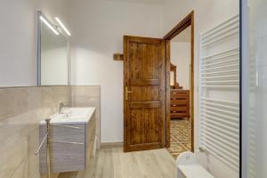 Koupelna v ubytování B&B Il Pozzo + 37 fotografií