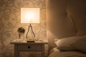 Posteľ alebo postele v izbe v ubytovaní Apartments & Rooms Perla