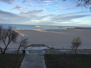 a view of a beach with the ocean at Seafront Faleza Nord in Constanţa