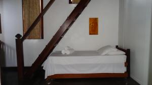 Postel nebo postele na pokoji v ubytování Atobá Villas