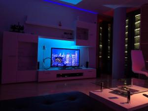 TV tai viihdekeskus majoituspaikassa Suite im Sony Center am Potsdamer Platz